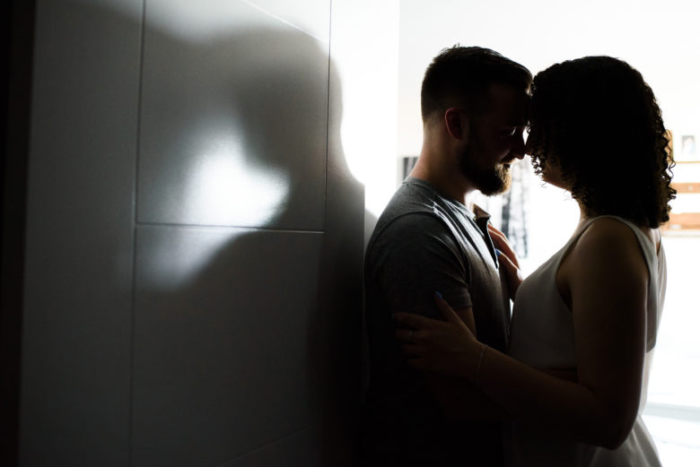 couple silhouette in apartment