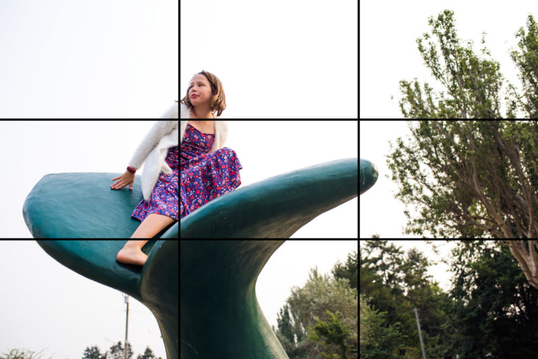 rule of thirds of child climbing on playground